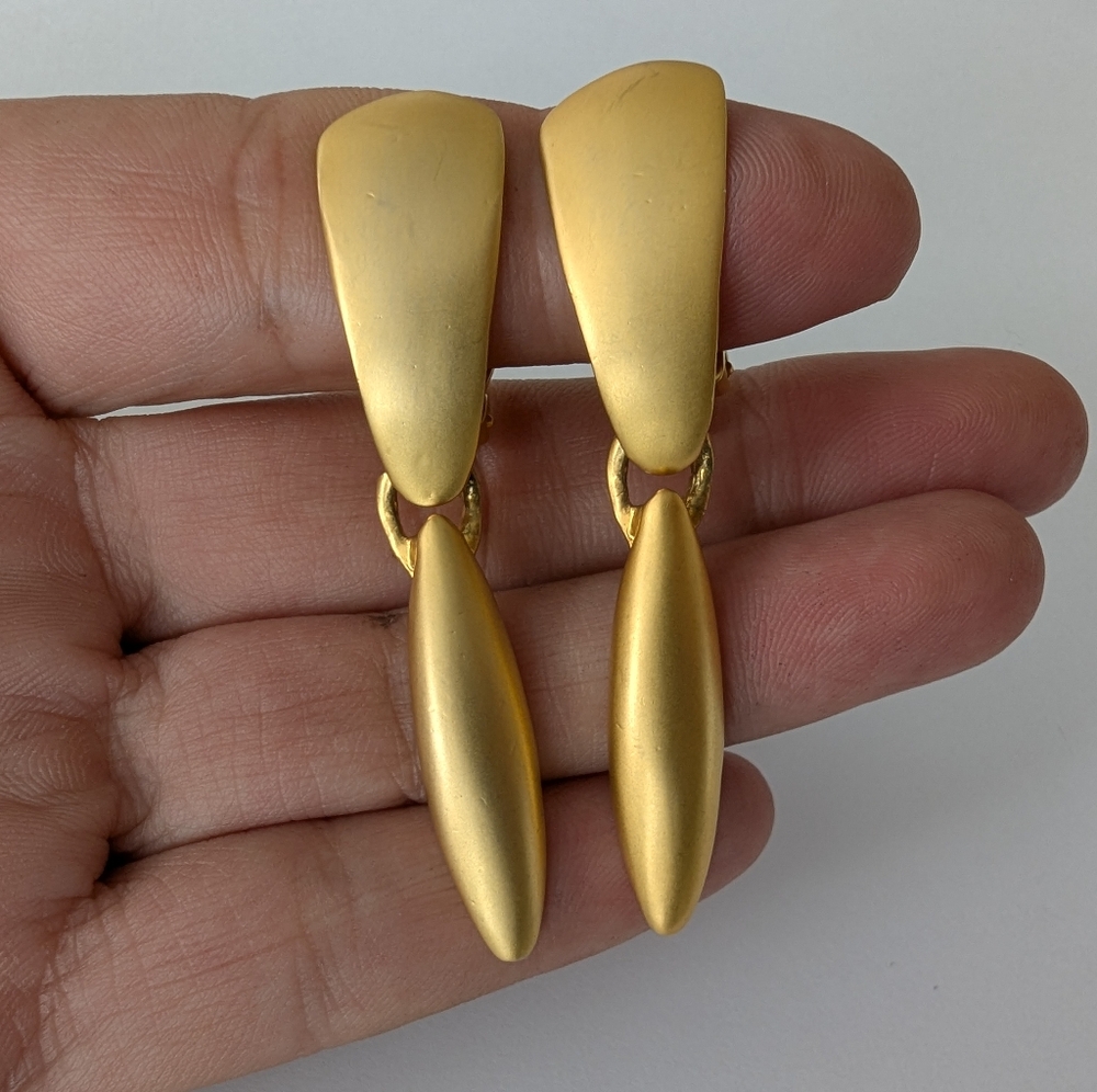 EVC BRUSHED GOLD TONE CLIP ON EARRINGS
